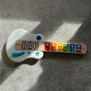 Baby Einstein Strum Along Songs Magic Touch Wooden Toy Guitar with Whammy Bar